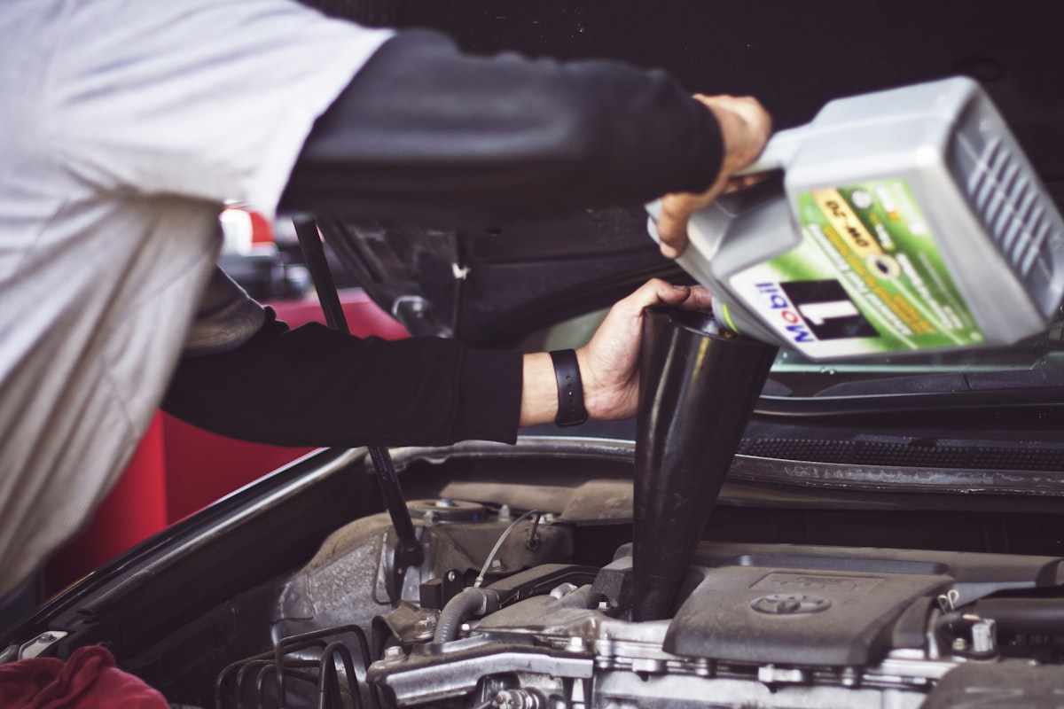 Mechanic working on truck engine